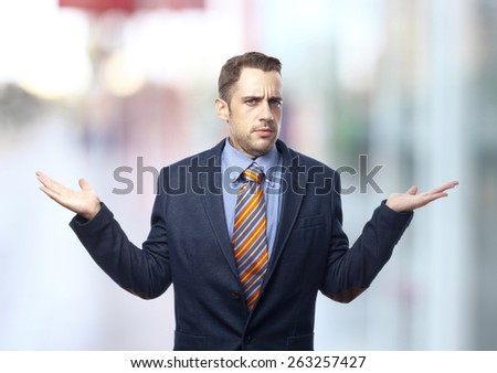 surprised and confused man in suit