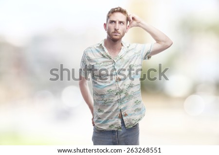 doubtfull ginger young man with hawaiian shirt