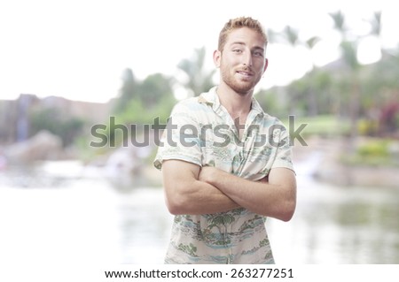 proud ginger young man with hawaiian shirt