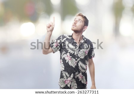 ginger young man  pointing up