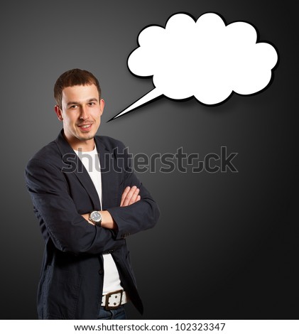 Business man with speech bubble, looking on camera
