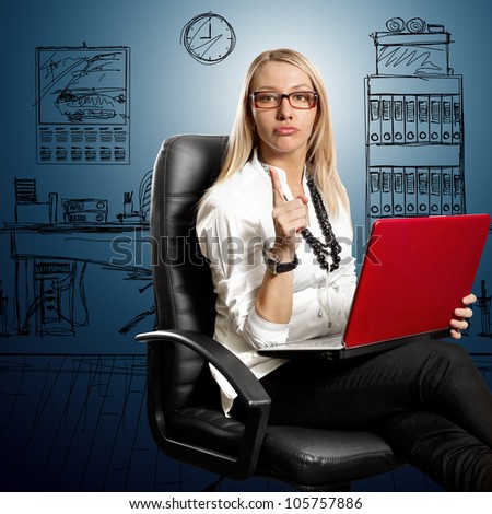 Business woman in leather chair, looking on camera