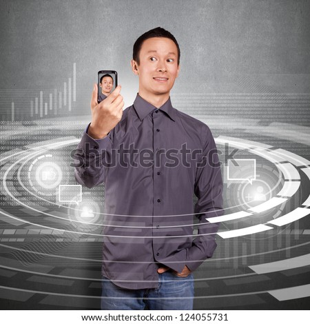 Asian man making an avatar on cell phone in social network