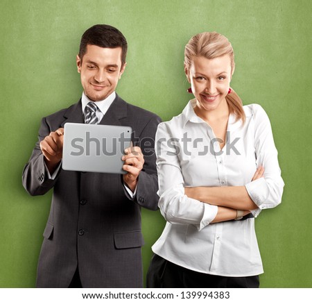 Business team, woman with folded hands and man with tou?h pad