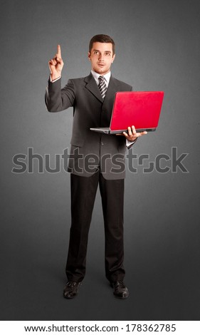 Idea concept. Business man shows something with his finger