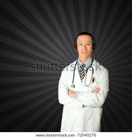 asian doctor with headphones, lab coat and stethoscope