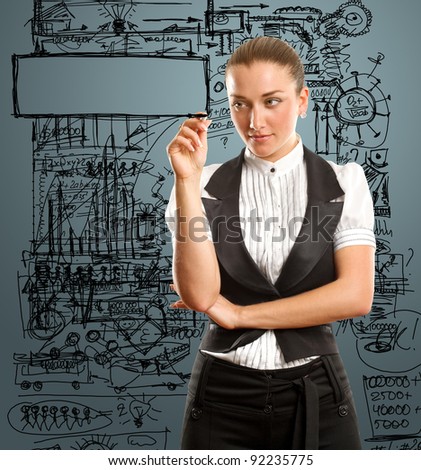 female writing something on glass board with marker