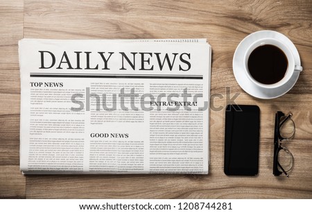 Newspaper with the headline News and glasses and coffee cup on wooden table, Daily Newspaper mock-up concept