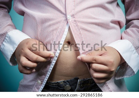 Fat boy can\'t  button up his shirt, Healthy and lose weight concept