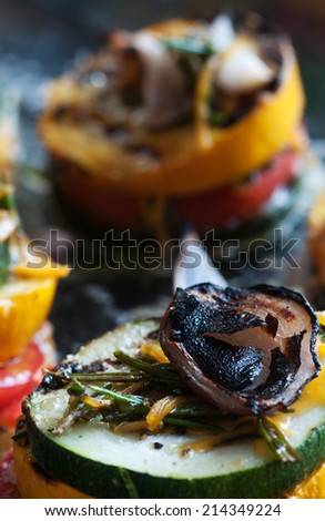Fresh vegetables from the garden grilled into rainbow towers
