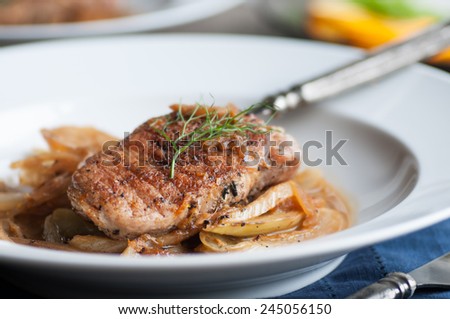 Seared Pork Chop over Fennel with Orange Pan Sauce