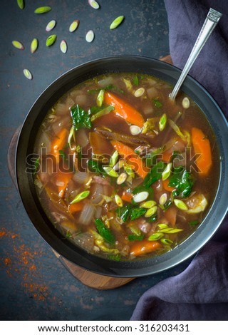 Nourishing bowl of chicken soup with vegetables