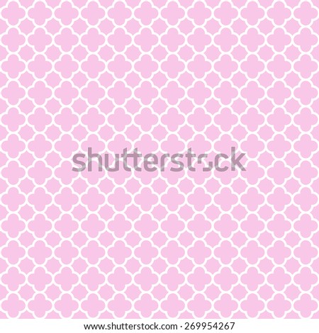 Cloverleaf quatrefoil lattice pattern with white lattice on a pretty pastel pink background. This is a seamlessly repeating pattern background.