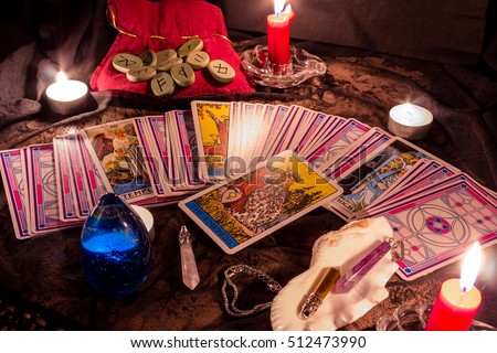 Tarot cards by candlelight in the evening