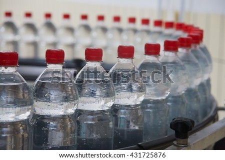 Bottling of mineral water in plastic bottles