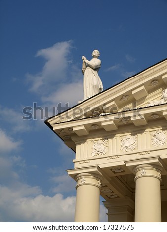 White statue on the roof of Vilnius cathedral, Lithuania