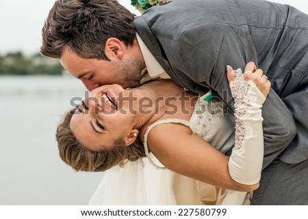 Wedding couple outdoor with lake on background