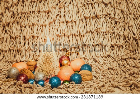 Christmas decoration with balloons  on warm background with christmas tree