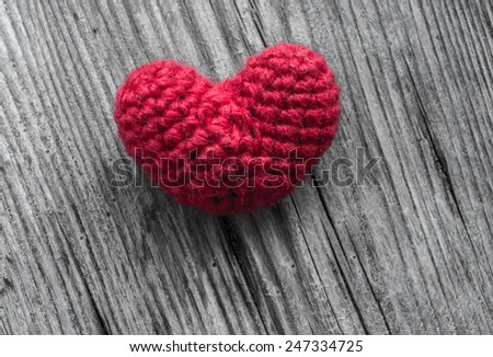 Red Heart Shaped Silk on Wood Background