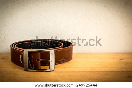 Belt Leather On Wood Table