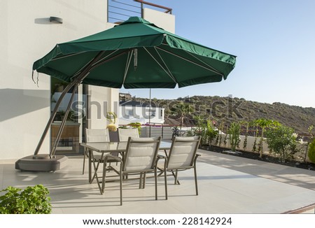 dinning table on the terrace in modern villa