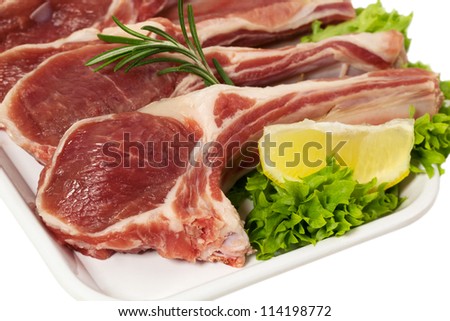 Raw Lamb Chops with Rosemary and Ingredient Isolated on White