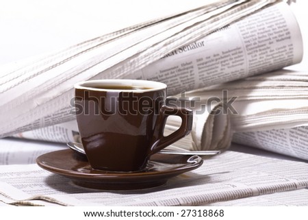 Pot of Coffee on newspaper background, business