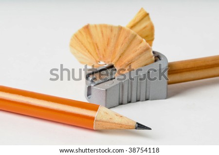 stock photo : Pencil and sharpener with pencil shavings