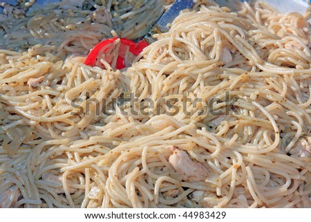 The cooking. Tasty spaghetti with a chicken meet