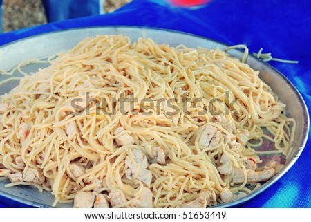 The cooking. Tasty spaghetti with a chicken meet