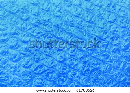 Abstract background. The closeup of the textured polymer