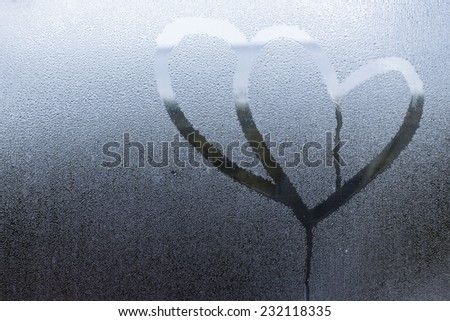 drawing heart love on water drop