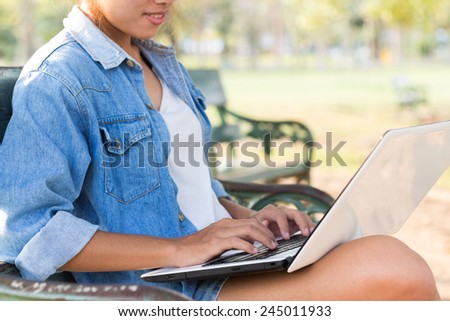 women feel happy use laptop computer outdoor freedom life concept
