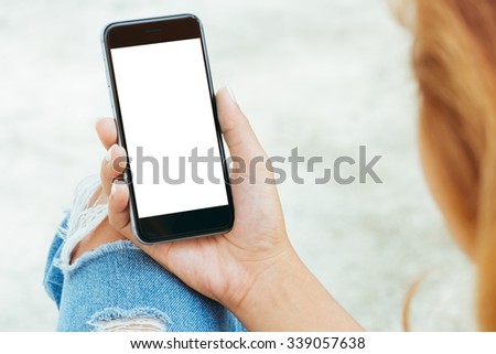 female using phone white screen display