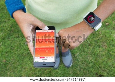 Bangkok, Thailand - Dec 5, 2015 : Women using iphone 6s and apple watch check health application