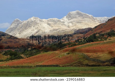Spring in the hills with the contrast of snow on the mountains in the background depicting the contrast of Winter against Spring