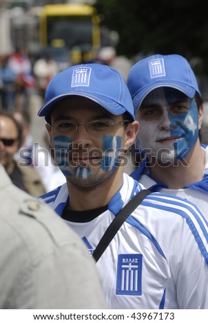 SALZBURG - JUNE 14: Greece football fans at the stadium before the football match Greece-Russia during the Euro2008 Group D. June 14, 2008, in Salzburg, Austria