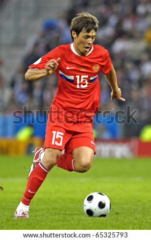 SALZBURG - JUNE 14:  Russian midfielder Diniyar Bilyaletdinov n.15 during the match Greece-Russia during the Euro2008 Group D. June 14, 2008, in Salzburg, Austria