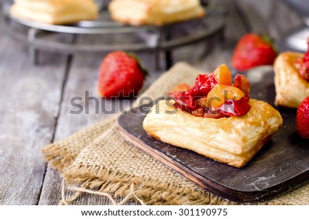 Cake of puff pastry with strawberry , tomato and meet, isolated
