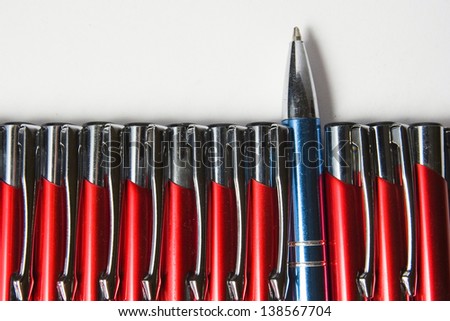 pens, one stands in a different position