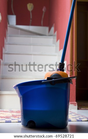 bucket, mop and stairway