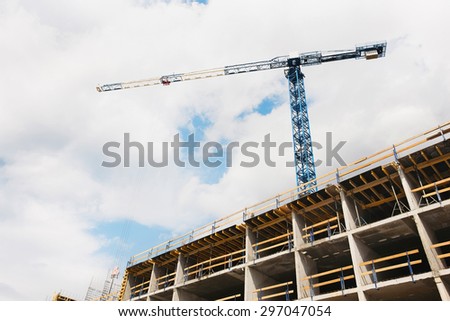 construction process. Construction of buildings, cloudy day