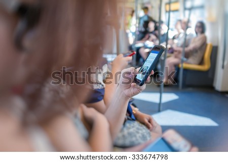 The atmosphere on the train People staring at a communication tool.