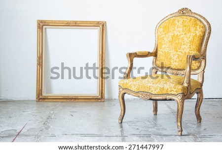 Luxury yellow vintage style armchair sofa with frame in a vintage room
