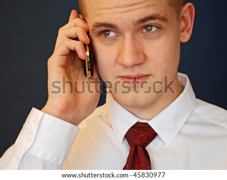 Young man with mobil telephone