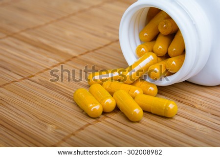 turmeric herb capsule, alternative medicine.