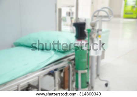 Blur rural Hospital beds and oxygen tanks