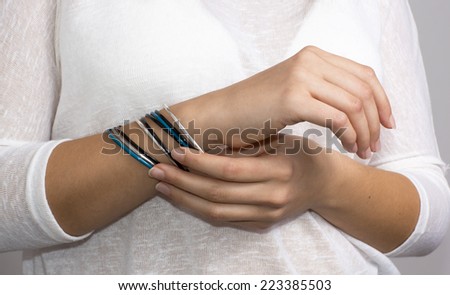 Young woman hands with jewelry, rings. / Girl hands with jewelry