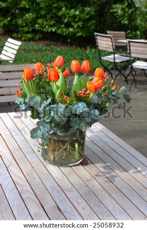 bunch of fresh cut tulips (Liliaceae) on garden table, Public Garden Keukenhof, Netherlands, Europe