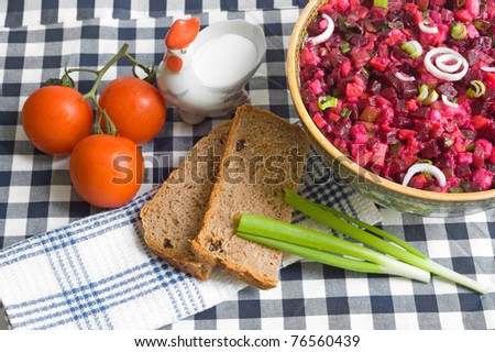 tradition ukrainian food  with bread,fresh tomatoes and onion on cloth